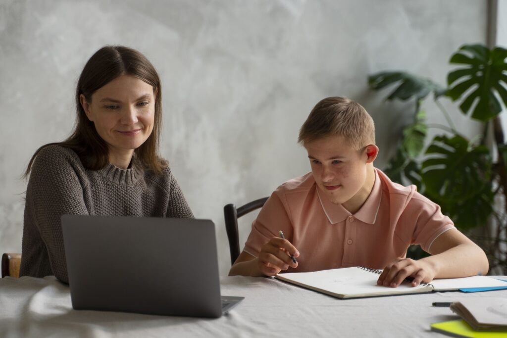 medium shot boy woman with laptop 1 1 scaled